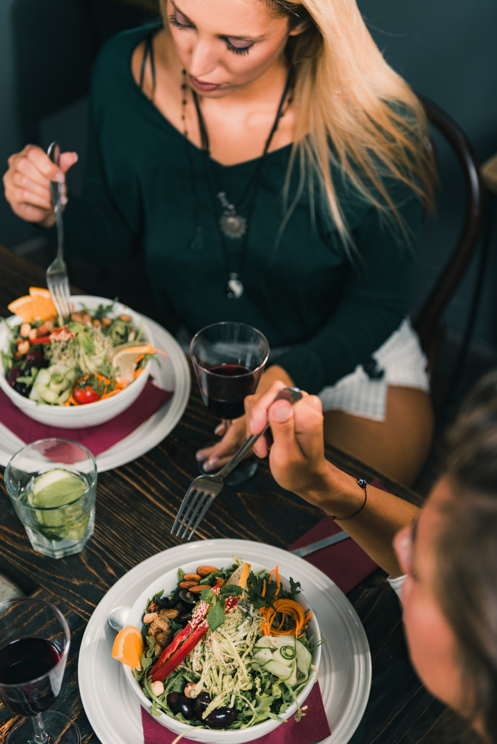 Vegetarian Restaurant. Young Woman In A Vegetarian Restaurant